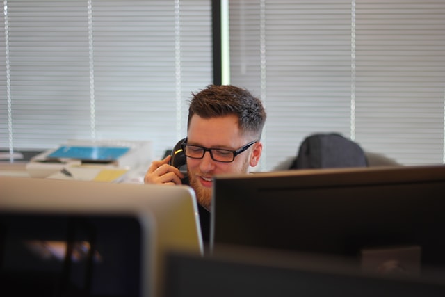 man working at a callcenter in barcelona